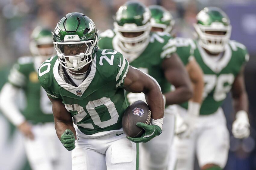 New York Jets running back Breece Hall (20) carries the ball for a touchdown against the Indianapolis Colts during the second quarter of an NFL football game, Sunday, Nov. 17, 2024, in East Rutherford, N.J.